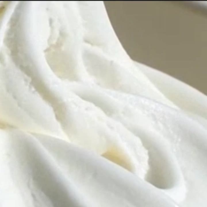 Frozen yogurt swirl, cropped in a soft blob shape